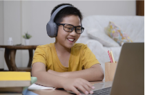 Child using computer for best home school program